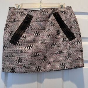 Kelly Wearstler miniskirt with leather zipper accents, pink/white/black.